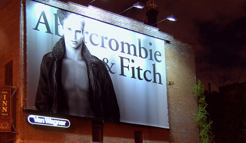 Abercrombie and Fitch billboard at night.